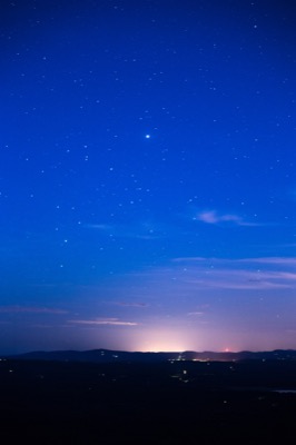 Brilliant Blue Night Sky and Bright Horizon
